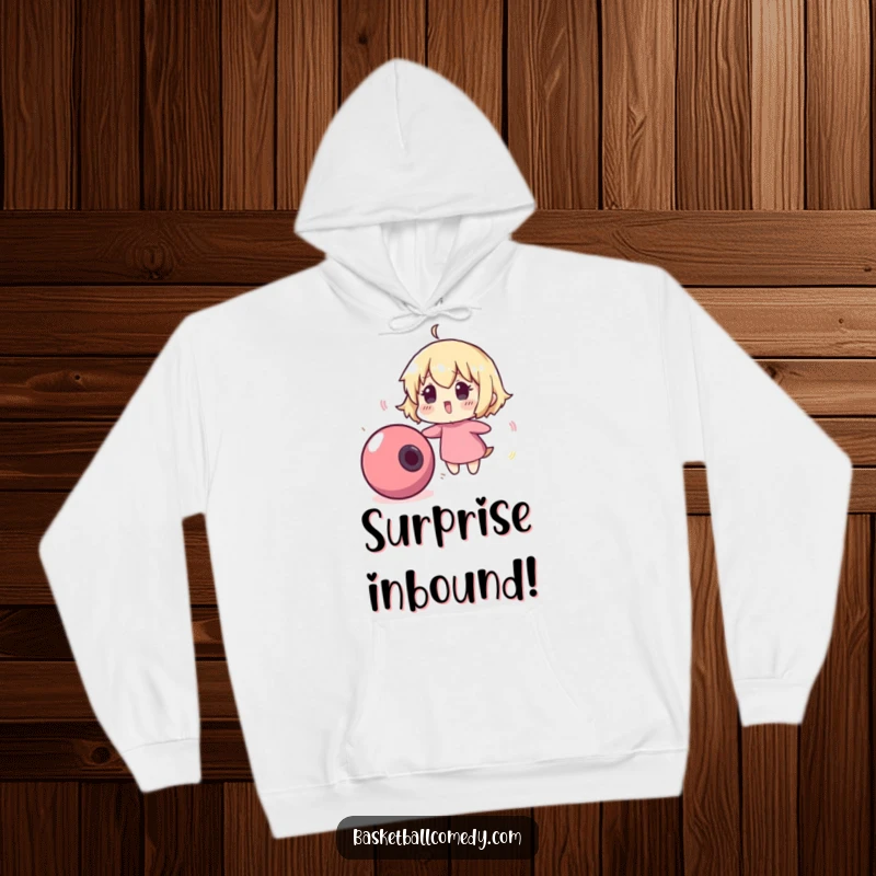 Funny hoodie depicting a cute character comically surprised by a runaway, bouncing basketball, capturing a moment of playful alarm.