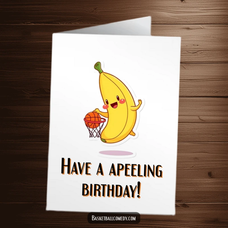 Funny Free Printable Birthday Card: A cheerful banana attempts to dunk a miniature basketball into a hoop with gusto.