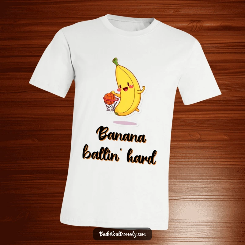 Funny banana t-shirt, a happy banana character attempting to dunk a small basketball into a hoop with enthusiasm.
