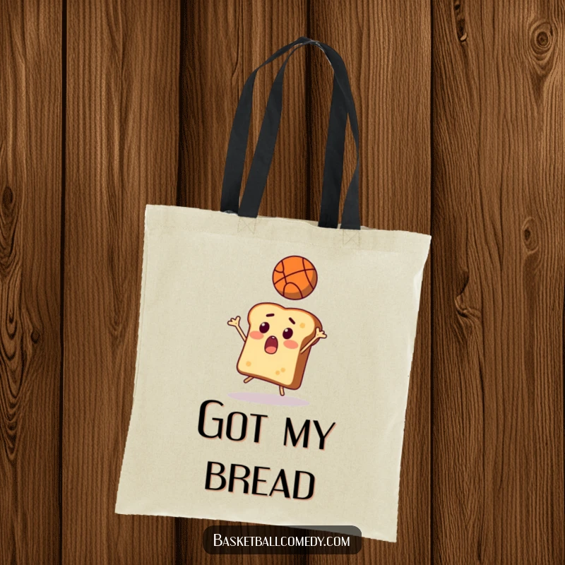 Funny toast tote bag, a surprised slice of bread attempting to catch a flying basketball, perfect for humorous shopping.